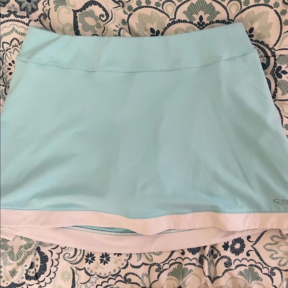Large blue and white Champion tennis skirt